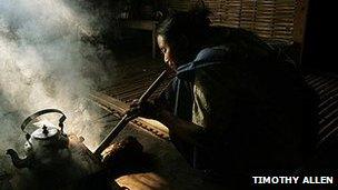 A Khasi woman cooking