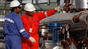 Oil workers in Rajasthan field