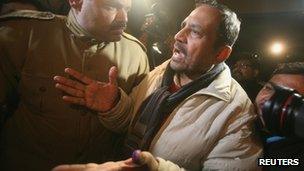 Suresh Kalmadi (R), former chief organiser of the Delhi Commonwealth Games, arrives at his residence after being released from the Tihar jail in New Delhi January 19, 2012