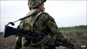 A Colombian soldier on patrol in the Cauca region, 18 January 2012