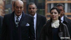 Asil Nadir arrives with his wife Nur at the Old Bailey courthouse in London 23 January