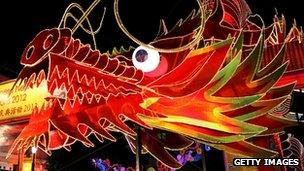 A large illuminated dragon in Chinatown in Singapore