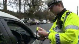 Policeman at car