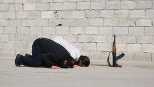 Guards praying at Misrata prison