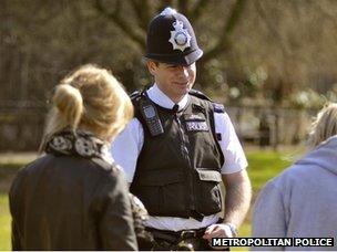 Officer talking to members of the public