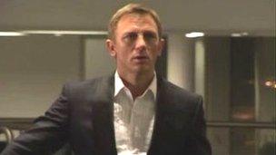 Daniel Craig as James Bond