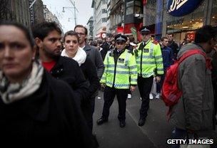 Police patrol shopping street