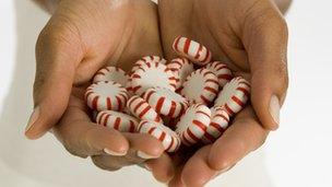 Woman holding sweets