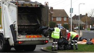 Bin men collecting rubbish in Rainham, Essex