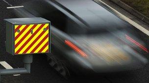 car passing a speed camera