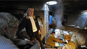 Homeless shelter in underground heating duct, Warsaw, 2 Feb 12