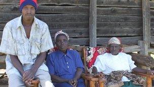 Franklin Chepkwony Soi (L) and his parents