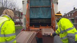 Dustbin men emptying brown bins