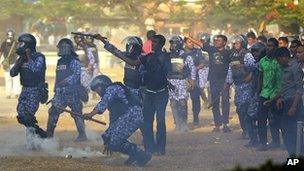 Police clash with the military during protests in the Maldives on 7 February 2012