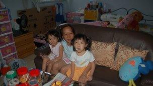 Ng Siew Teen and her daughters at home in Singapore on 2 February, 2012