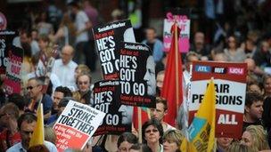 Demonstrators in central London as they take part in a protest through the capital against the UK government's plans for pension reform