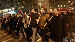 Protesters march during a rally against austerity measures in Athens on 9 February