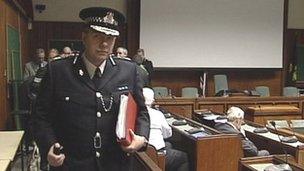 Chief Constable Tony Melville arrives for the budget meeting