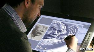 Currency designer working on banknote design