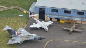 Aircraft outside hangar at Gloucestershire Airport