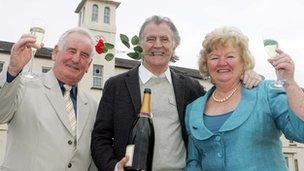 BBC Radio Foyle's Gerry Anderson on the parade ground with Daphne and Joe McAllister, who celebrate 50 years of marriage on Tuesday