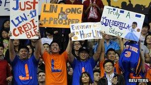 Fans raise signs at the New York-Toronto game, Toronto, Canada 14 February 2012