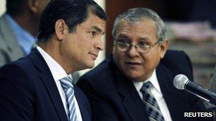 Rafael Correa (left) with his lawyer at the hearing at the National Court of Justice