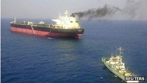 The Napoli registered Italian merchant vessel Enrica Lexie (L) is anchored off the harbour in the southern Indian city of Kochi February 16, 2012