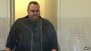 Kim Dotcom enters a New Zealand courtroom, 25 January 2012