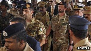 Members of the Italian navy are taken for interrogation by the Indian police in the southern state of Kerala on 19 February 2012