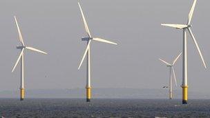 General view of wind turbines at sea