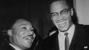 Martin Luther King and Malcolm X shaking hands