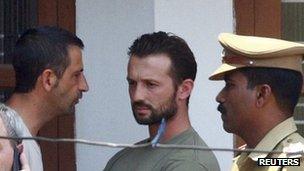 Salvatore Girone (centre) and Latorre Massimiliano (left), marines aboard the Enrica Lexie, at the guest house of the Central Indian Security Force, in the southern Indian city of Kochi - 20 February 2012