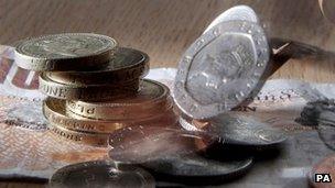 Assorted pound notes and coins