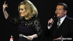 Adele with host James Corden at the Brit Awards