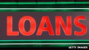 A neon sign saying 'loans'