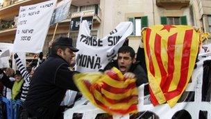 Anti-monarchy protesters demonstrate near a courthouse where Inaki Urdangarin, the son-in-law of Spain's King Juan Carlos, arrived for questioning over corruption allegations