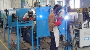 Staff at work at Sharada Motor Industries plant