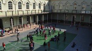 Children playing Raspall - traditional Valencian ball-game