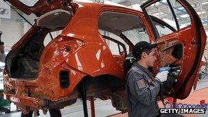 Employee of Great Wall Motor working on a new vehicle at the company's plant in Bahovitsa, Bulgaria