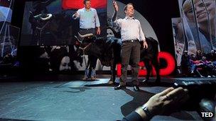 Lior Zoref and an ox on the TED stage