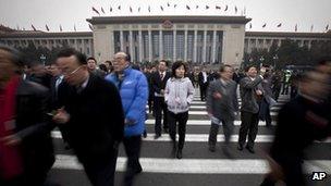 Delegates leave the Great Hall of the People after attending the opening session of the Chinese People's Political Consultative Conference (CPPCC) in Beijing, 3 March 2012