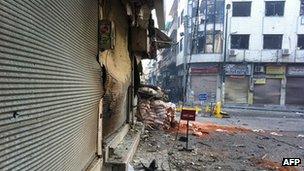 Battered street in Homs. 4 March 2012