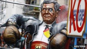 German President Christian Wulff is pictured during of the traditional Rose Monday street carnival parade in Mainz