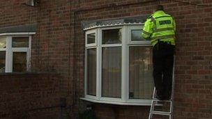 Policeman applying Smartwater to Nottinghamshire house