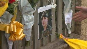 Tributes outside the home of Pte Christopher Kershaw in Bradford