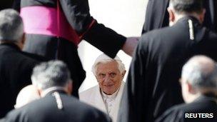 Pope Benedict XVI is surrounded by bishops during his weekly address at St Peter's Square, Vatican City 7 March 2012