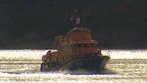 The lifeboat returns from the rescue