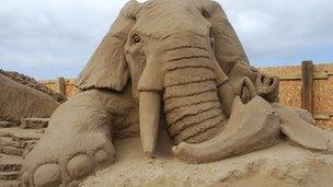 Sand sculptures of an elephant in Weston-super-Mare