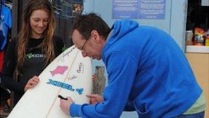 Surfboard signing